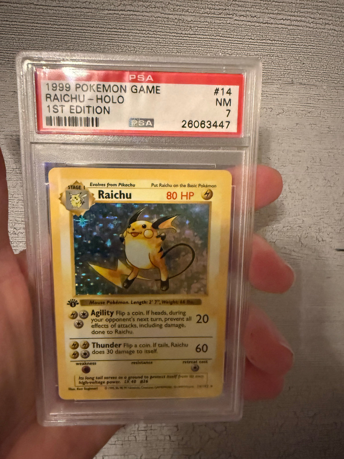 Raichu [1st Edition] - Pokemon Base Set #14 PSA 7